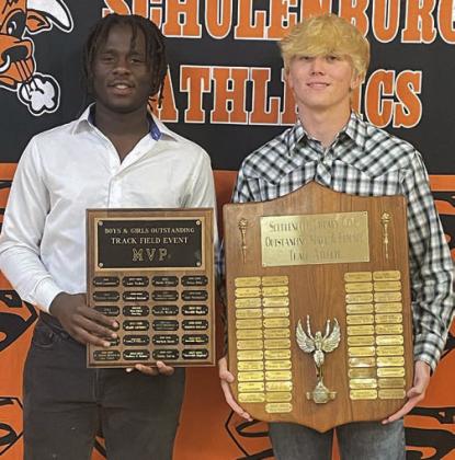 BOYS’ TRACK – (from left) Rodney H. Walton, Field Event MVP; and Nick Goode, Rotary Club Outstanding Male Track Athlete. Sticker Photo By Darrell Vyvjala