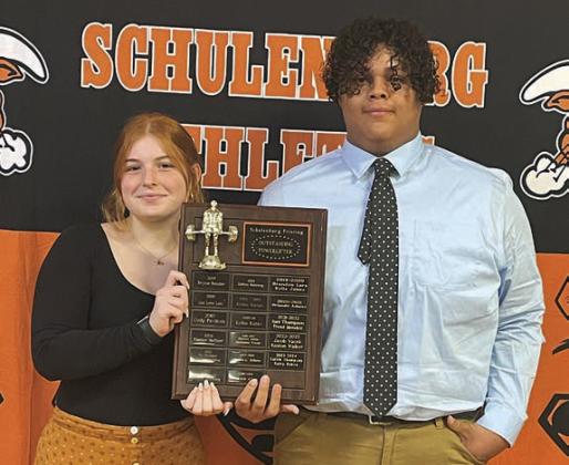 POWERLIFTING – (from left) Katry Kobza and Calvin Thompson, Outstanding Powerlifting Award. Sticker Photo By Darrell Vyvjala