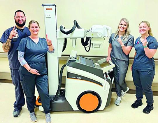 The new portable digital radiology mobile unit at St. Mark’s, with staff members Noel Rios, Debra Meyers, Whitney Leer and student Ally Trlicek.