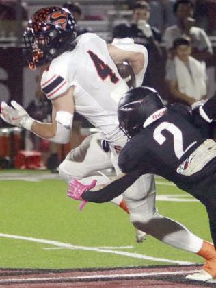 Jayse Janda turns upfield on a 21-yard reception in the fourth quarter. Sticker Photo By Darrell Vyvjala