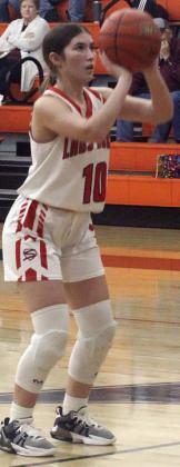 Gracie Burton lines up a technical free throw that put the Lady Horns up by one late in the third quarter Friday. Sticker Photo By Darrell Vyvjala