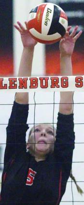 Brooke Redding taps back a Lady Comanches over-pass in the fifth set.