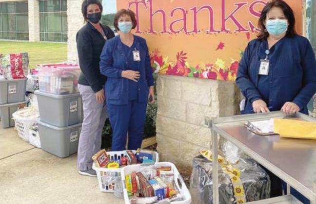 St. Rose donates to Food Pantry, Family Crisis Center at Thanksgiving Mass