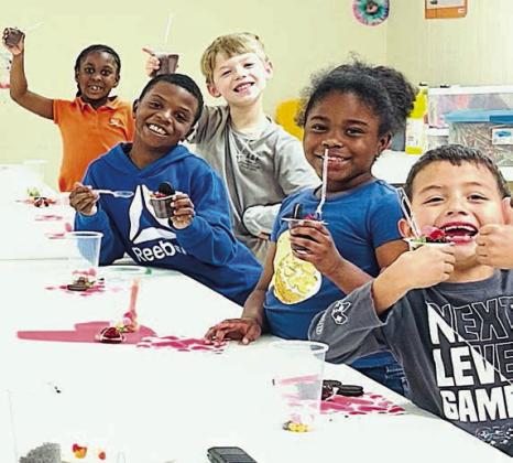 At the Schulenburg Unit of the Boys &amp;amp; Girls Club, Ms. Taliyah Wright facilitated a Valentine’s Day celebration by creating “dirt cups” with her members. Shown are (from left) Club members Jakhaylin Caine, Braxton Spradley, Dredyn Wright, Legacy Crenshaw and Valdemar Pineda.