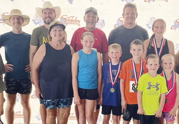Largest Family Group – the Hollas family. Sticker Photo By Darrell Vyvjala