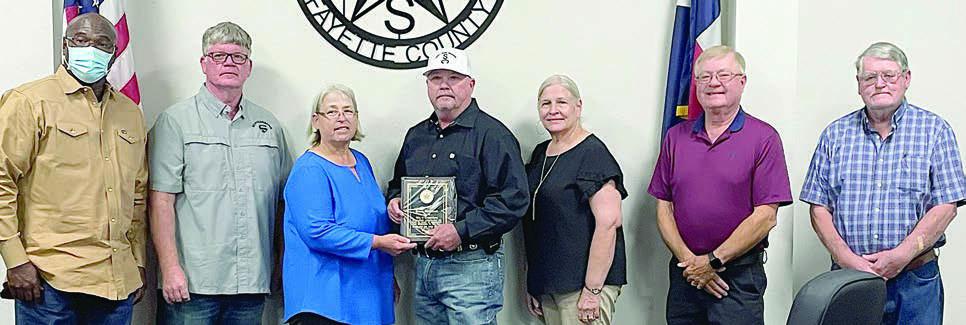 Plaque presented to Strickland