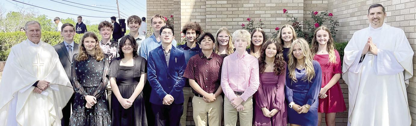 Attending the Chrism Mass in Victoria on March 26 were: Front row, from left: Rev Jasper Liggio-St. Rose pastor, Valerie Sedlar, Destani Brown, Christopher Campos, Maximo Hernandez, Allen Ballard, Anna Oeding and Layney Conner. Back row, from left: William Taylor, Charlie Shank, Adam Schramek, Brock Seger, Denver Carr, Ashtyn Schaefer, Brenley Bujnoch, Layne Besetzny, Miranda Bonner and Rev. Luke Prihoda.