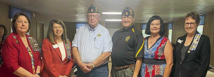 Special guests at the May 18 meeting, shown with chapter officers, included (from left) Cathleen Tutt, vice regent; Holly Marie Howard, King’s Highway Chapter NSDAR, who installed officers; Lyn Reavis, commander of American Legion Quade-Werchan Post 338; guest speaker Bruce Bockhorn, adjutant of Post 338 and his wife, Carobeth Bockhorn; and Kathy Schatte, chaplain.