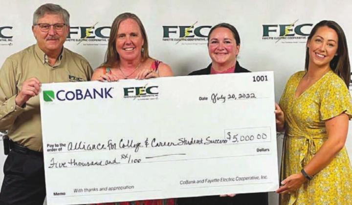 Alliance for College &amp;amp; Career Student Success (ACCSS) receiving its $5,000 grant. Shown are (from left) Fayette Electric Cooperative General Manager Gary Don Nietsche; Susie Shank, ACCSS director; Sarah Nickel, ACCSS student success coach; and Susannah Mikulin, Fayette Community Foundation executive director.