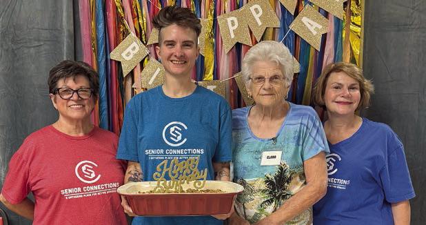 Available for the June birthday picture were (from left) volunteer Brenda Ray, volunteer and art instructor Jaime Janda, Clara Christ and volunteer Pam Janda.
