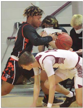 Keisean Johnson gets steal in the 2nd half. Sticker Photo By Kade Vyvjala