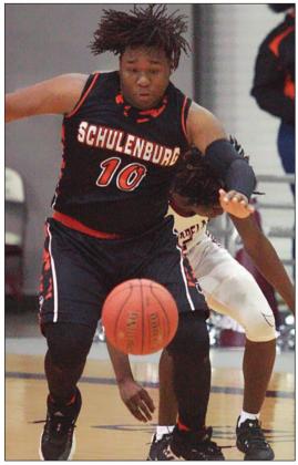 T.J. Speed chases down a loose ball in the third quarter.  Sticker Photo By Kade Vyvjala