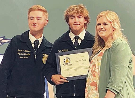 Kaz McBride (center) received the Joanne Shelton Exceptional Service Scholarship for $1,000 for being chosen Outstanding Senior Ambassador. He is shown with Nathan Atkinson (left), Texas FFA officer, and Chanda Orren (right), Texas FFA Ambassador program coordinator.