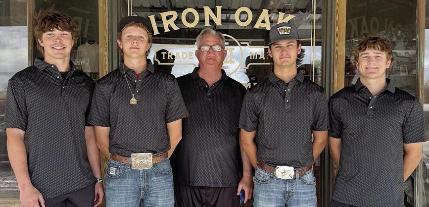 Showing off the apparel donated by Iron Oak are Shorthorn golfers (from left) Jayse Janda and Tayt Wenske, (from right) Reid Janda and Brant Redman, along with coach Richard Hoogendoorn (center). Team members not pictured: Van and Koi Prihoda.