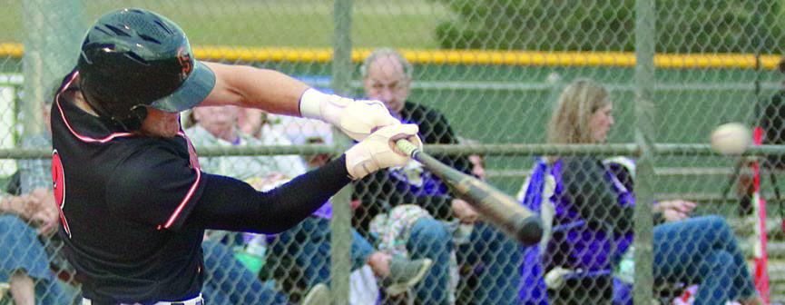 Reid Janda sends a double to left-centerfield to lead off last Tuesday’s game. Sticker Photo By Darrell Vyvjala