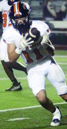 Jayse Janda secures a fourth-quarter catch that went for 26 yards. Sticker Photo By Darrell Vyvjala