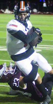 Jose Cortez gets upfield for a first down on an 8-yard reception in the second quarter. Sticker Photo By Darrell Vyvjala