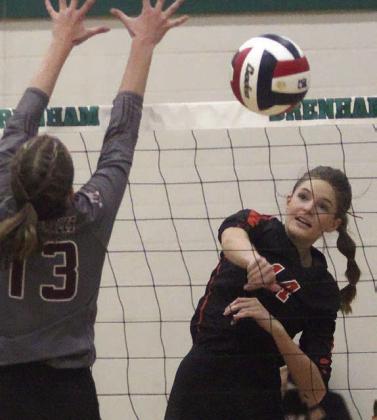 Emmrie Marx fires a kill past a Lady Eagle in game five..