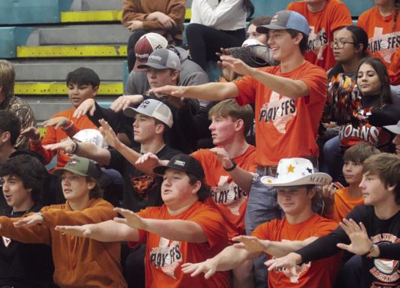 In addition to spirited cheering for the Lady Horns, some of the guys in the students’ section show their moves as “Macarena” was played in between sets.