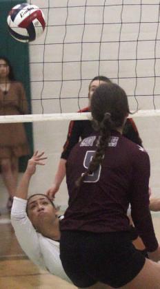 Kieryn Adams dives for a dig in game one.