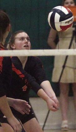 Avery Helms sends a pass on its way in the first set.