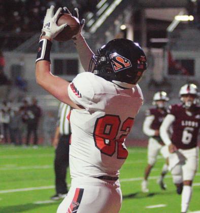 With the nearest Kenedy defenders in the distance, Hayden Schulz gathers in a touchdown pass in the third quarter. Sticker Photo By Layne Vyvjala