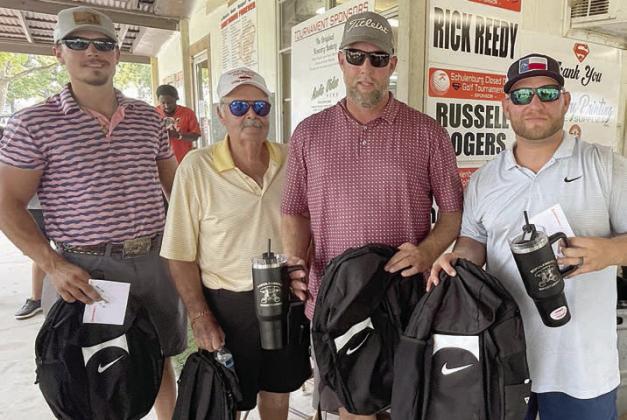 1ST PLACE, FIRST FLIGHT (17 under par / 55) – (from left) Jake Barnick, Butch Jackson, Derek Grahmann, and Ian Voskamp. Sticker Photo By Darrell Vyvjala