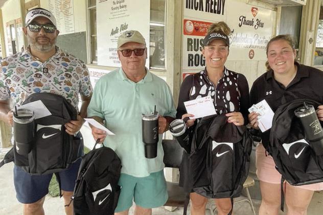 1ST PLACE, SECOND FLIGHT (9 under par / 63) – (from left) Randy Medina, Jackie Machac, Crystal Schmalzreid, and Allison Machac. Sticker Photo By Darrell Vyvjala