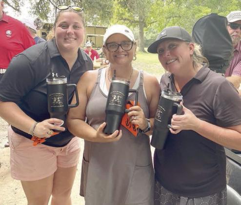 LADIES’ CLOSEST-TO-THE-PIN &amp; LONG DRIVE – (from left) Allison Machac, closest-to-the-pin on hole No. 7; Kim Wellborn, closest-tothe- pin on hole No. 4; and Jamie Montgomery, long drive on hole No. 3. Sticker Photo By Darrell Vyvjala