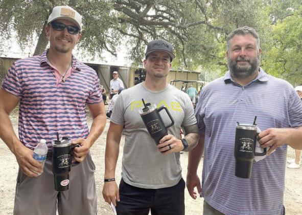 MEN’S CLOSESTTO- THE-PIN &amp; LONG DRIVE – (from left) Jake Barnick, long drive on hole No. 3; Myke Ortiz, closestto- the-pin on hole No. 7; and Cliff Kozelsky, closest-to-the-pin on hole No. 4. Sticker Photo By Darrell Vyvjala