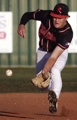 Shortstop Reid Janda charges a Bulldogs grounder for an out in the first inning. Sticker Photo By Darrell Vyvjala