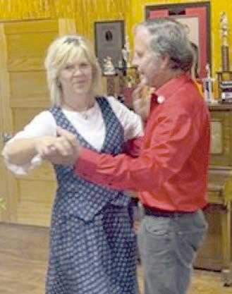 As polka music played at the Polka Lovers Club of Texas Museum, Eva Pavlová (left), wife of President Pavel, danced a polka with Gary Bucek (right), PLCTM president.