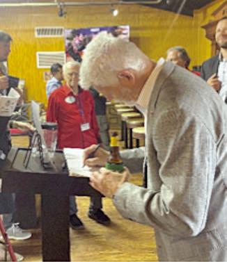 At the Polka Lovers Club of Texas Museum, President Petr Pavel signs the register as the delegation prepares to leave.