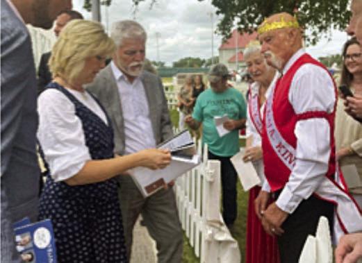 President Petr Pavel and his wife Eva Pavlová (at left) were very congenial and took time before lunch to talk with the public. They are shown speaking to Chris and Doris Benson, King and Queen of the Texas Chapter of the Polka Lovers Klub of America.