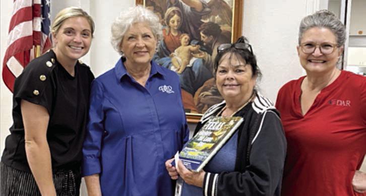 Texas Before the Lone Sta r was donated to St. Rose of Lima Catholic School by the John Everett Chapter of the Daughters of the American Revolution. Shown are (from left) Taylor Jensen, St. Rose principal; Connie Dittrich, DAR chapter historian; Doris Bujnoch St. Rose librarian; Donna Pustejovsky, DAR literacy chair.