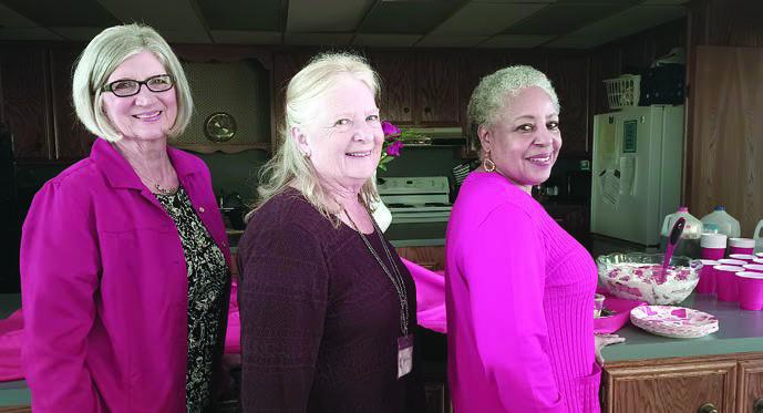 Hostesses were (from left) Julie Clements, Janet Murphy and Shawn Willis.