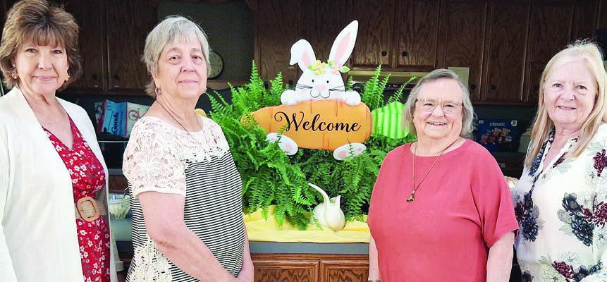 Hostesses were (from left) Diane Holub, Debbie Behlen, Carolyn Neely and Janet Murphy.