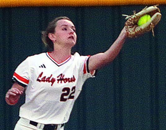 Right fielder Miranda Bonner makes a running catch against Weimar. Sticker Photo By Darrell Vyvjala