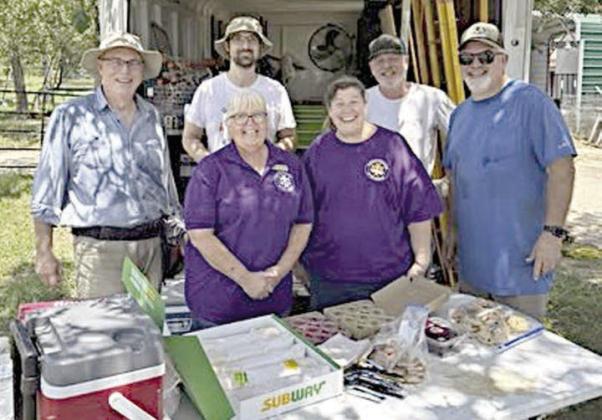 The CDA Court from Schulenburg, represented by (front row, from left) Phyllis Valchar and Grace Lebeda, provided a meal for Habitat for Humanity volunteers on May 11. Habitat volunteers shown are (back row, from left) Matt Hioldeman, Ian Holdeman, Sven Mesecke and Shawn Raborn.
