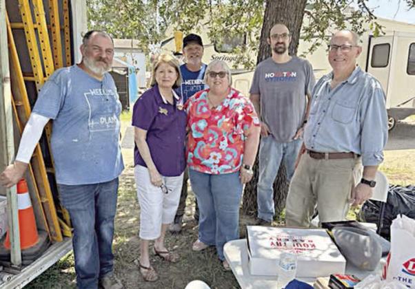 The CDA Court from Flatonia, represented by (front row, from left) Kathleen Svatek and Kathy Carpenter, provided a meal for Habitat for Humanity volunteers on May 12. Habitat volunteers shown are (back row, from left) Kenny Couch, Sven Mesecke, Ian Holdeman and Matt Holdeman.