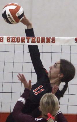 Meredith Magliolo sends down a kill last Tuesday. Sticker Photo By Darrell Vyvjala