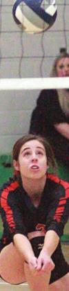 Claire Antosh picks up a dig in game one of the regional final. Sticker Photo By Layne Vyvjala
