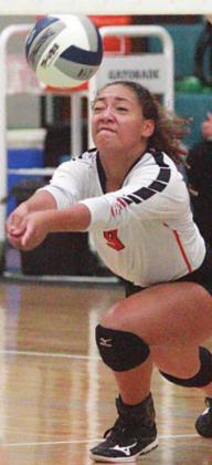 Kieryn Adams picks up one of her team-high 16 digs in game three. Sticker Photo By Layne Vyvjala