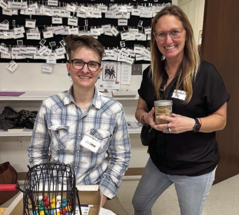Two bingo callers for the price of one – Jaime Janda (left) filled in for Elizabeth Fox (right) from Freyburg Hall until she could arrive. She is sporting a jar of cookies baked by members. Members are also reminded to bake more cookies to give to the speakers and bingo callers to thank them for their time and energy!