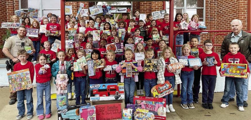 St. Rose classes donate to PAT , Deputy Santa