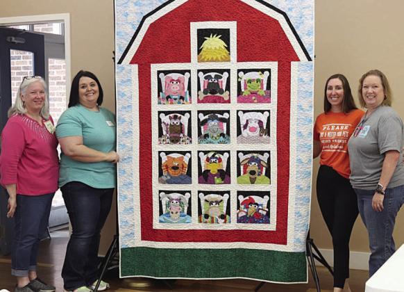 CVQG donates quilt to benefit animal Shelter