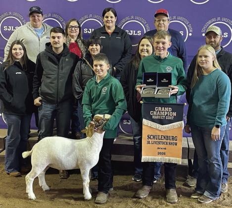 GOAT – Exhibitor: Hudson Holub (front, left). Sale price: $8,000. Sticker Photo By Darrell Vyvjala