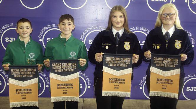 PROFICIENCY QUIZ – From left: Gage Smrkovsky, Junior Division reserve champion; Crockett Guenther, Junior Division grand champion; Kyrroll Prihoda, Senior Division reserve champion; and Jolene Jarvis, Senior Division grand champion. Winners scored the best on a test over general livestock knowledge. Sticker Photo By Darrell Vyvjala