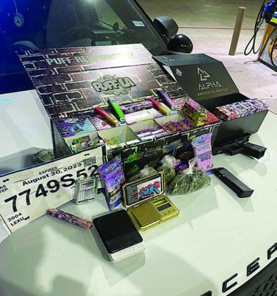 The items seized by the Schulenburg Police Department after a traffic stop on Aug. 22 are shown above, including the fake driver’s tag, drugs and drug paraphernalia, as well as a handgun.