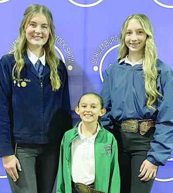 SALESMANSHIP – (from left) Madyson Holub, Senior Division; Emma Zweschper, Junior Division; and Kimber Bartosch, Intermediate Division. Award based on exhibitors visiting with potential buyers before the sale to discuss their projects. Sticker Photo By Darrell Vyvjala